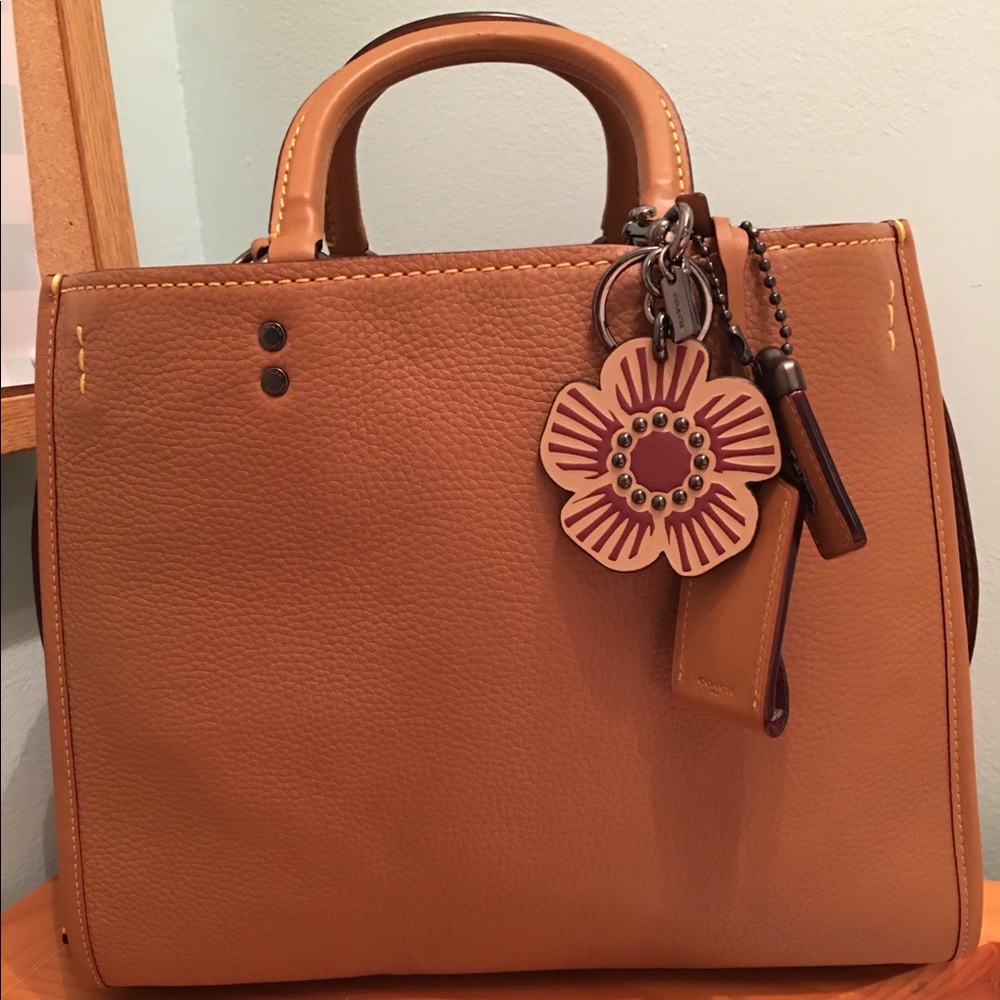 Coach Tan Leather Satchel with Floral Charm